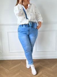 Off-white and blue shirt: Sania