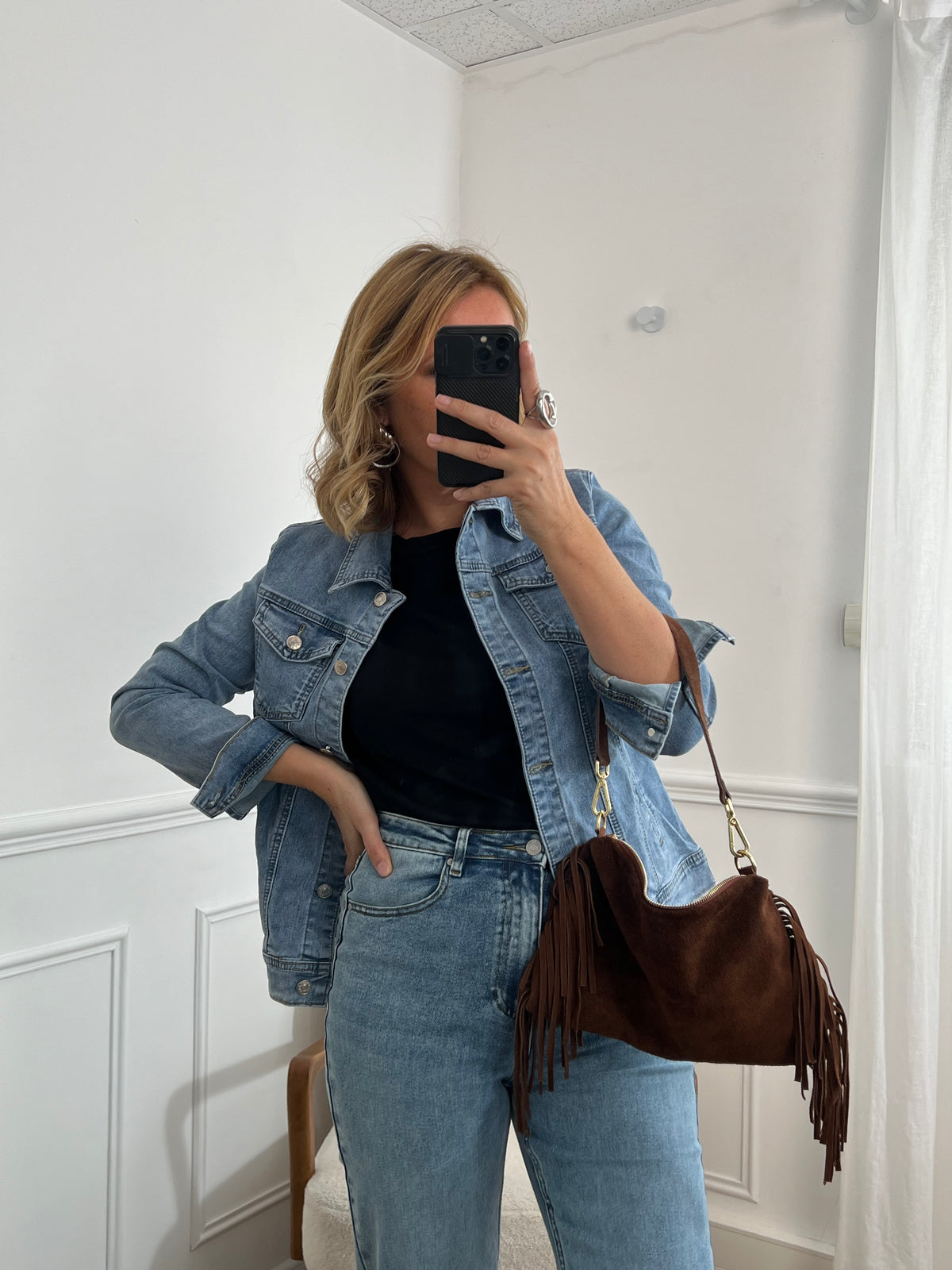 Light blue denim jacket: Mya