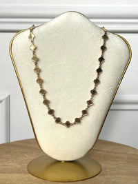 Collier doré : Baena