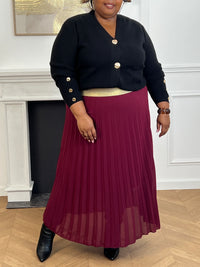 Découvrez notre jupe plissée, conçue en taille unique pour flatter les silhouettes du 42 au 50, disponible dans une gamme de couleur captivantes pour s'adapter à chaque style