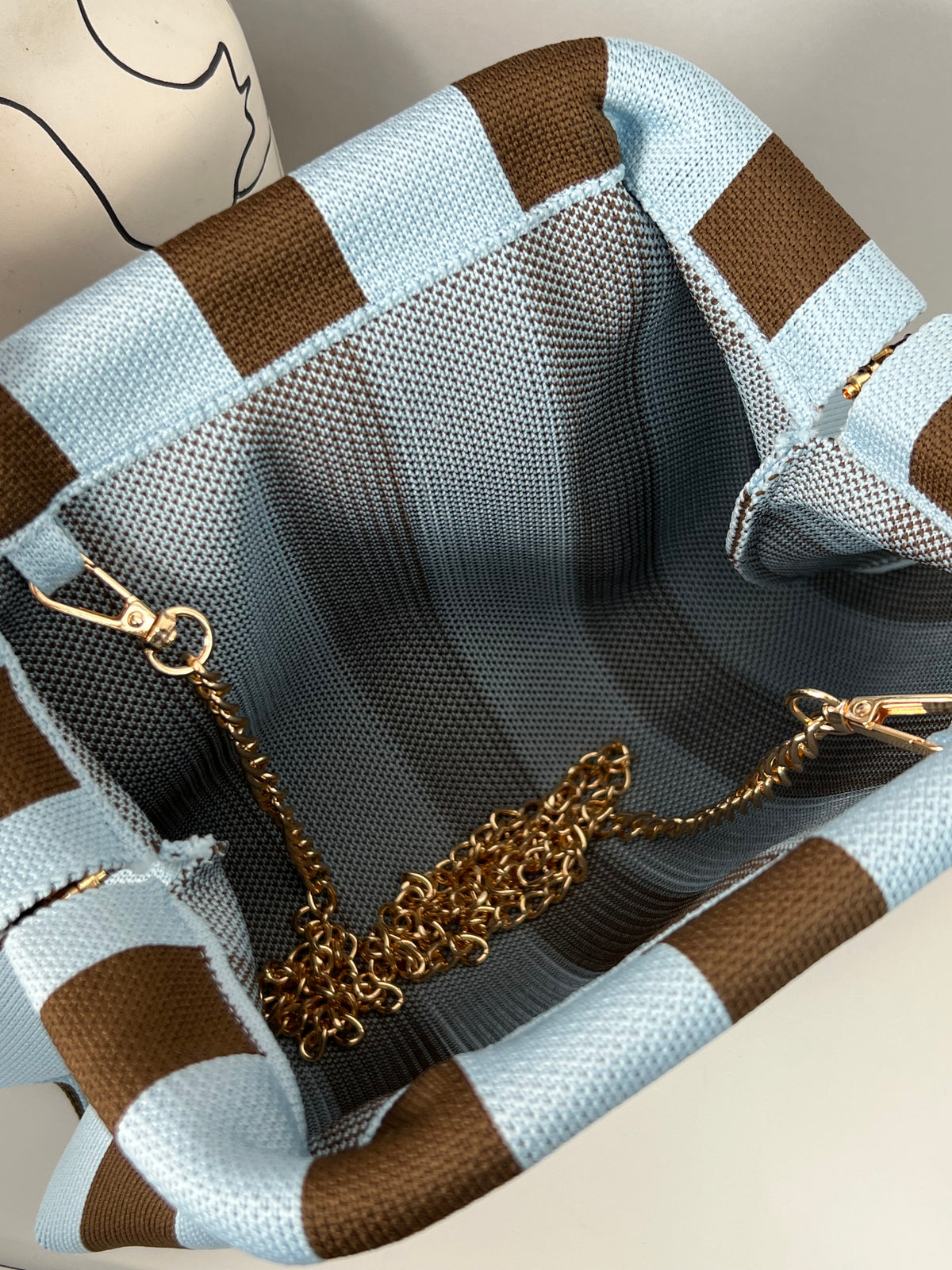 Braune und blaue Clutch: Kaly
