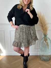 Adoptez le style félin avec notre jupe short doré grande taille. Confortable et tendance, cette pièce unique met en valeur votre silhouette avec une touche sauvage. Commandez la vôte maintenant et sublmiez votre look avec élégance !