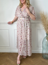 Profitez d'un look élégant et féminin avec la robe longue dorée Atea. Avec ses motifs floraux, elle apportera une touche de romantisme à votre tenue. Parfaite pour toutes occasions, cette robe mettra en valeur votre silhouette et vous fera briller de mille feux.
