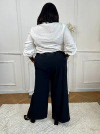Pantalon grande taille noir vue de dos