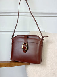 Sac marron : Calvyn - Loïcia