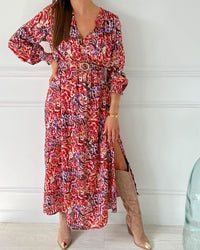 ROBE LONGUE VIOLETTE ROSE BEIGE Robe longue à manches longues Elastique à la taille avec ceinture amovible Col cache cœur Couleurs : imprimé violet rose et beige Composition : 100% polyester Lavage à la main obligatoire