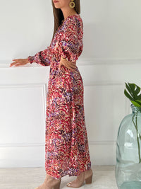ROBE LONGUE VIOLETTE ROSE BEIGE Robe longue à manches longues Elastique à la taille avec ceinture amovible Col cache cœur Couleurs : imprimé violet rose et beige Composition : 100% polyester Lavage à la main obligatoire